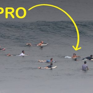 Pro Surfer Negotiates Thick Crowd (Opening Scene) - Uluwatu