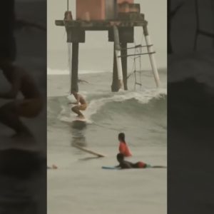 Surfing on crowded wave at Batukaras, Indonesia