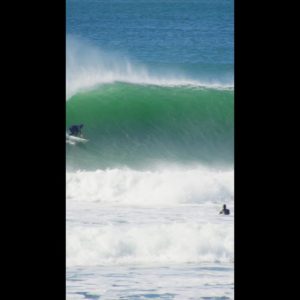 Surfer finds a Green Tube at Ocean Beach