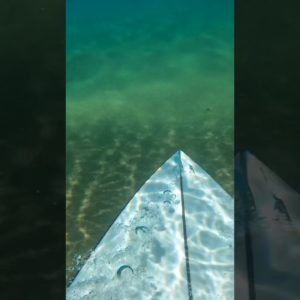 SURFER DUCKDIVING IN GLASSY SATISFYING CONDITIONS! (POV)